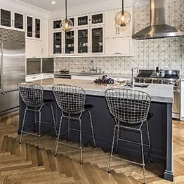 Spacious classically kitchen design with three stylish bar chairs in Chicago