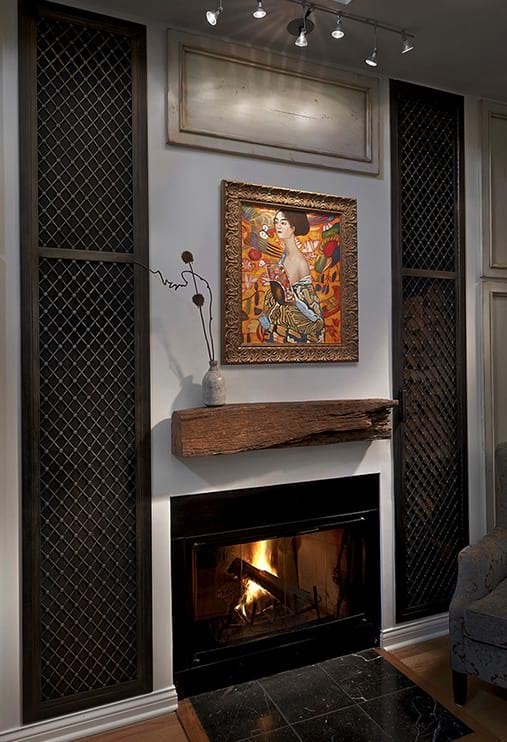 Relaxing open living space with modern fireplace and bright painting project photo in Chicago