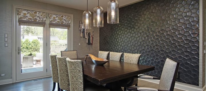 Beautiful dining room space with comfortable chairs and amazing wall decor in Highland Park