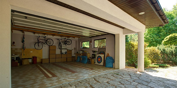 House with open garage building after renovation