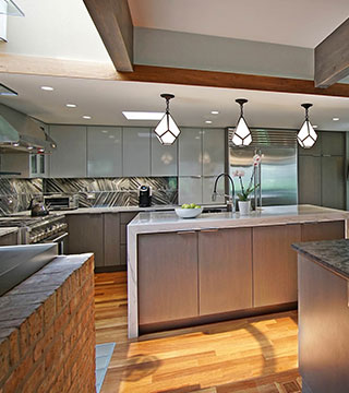 Fabulous two tone kitchen cabinets combined with big eating area in Lake Forest