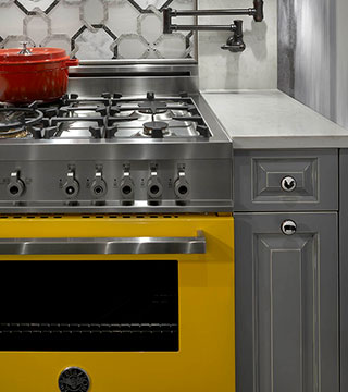 Stylish yellow stove design after kitchen remodeling in Chicago