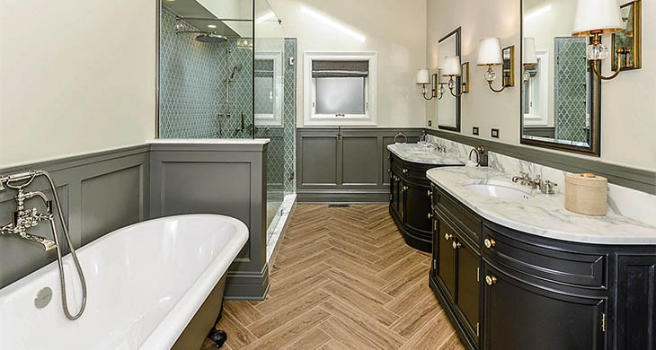 Stylish bathroom with glass-enclosed shower