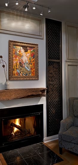 Relaxing open living space with modern fireplace and bright painting in Chicago