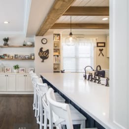 Room addition with archway to another room space in Highland Park