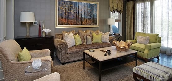 Neutral eclectic coastal family room with table and unique painting in Highland Park