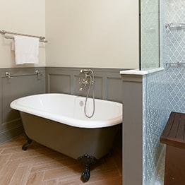 Functional stylish bathroom with glass-enclosed shower in Chicago