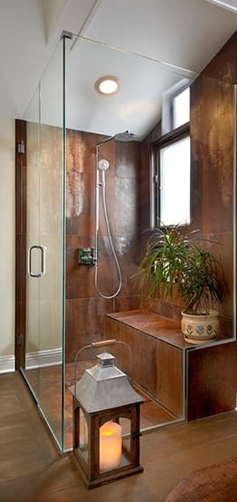 Stylish brown enclosed glass shower with lantern element in Chicago