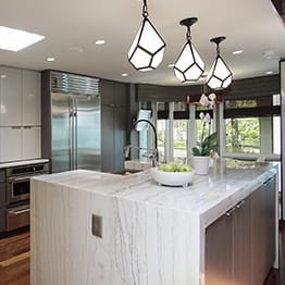 Modern grey color kitchen design with wooden flooring and big eating area in Lake Fores