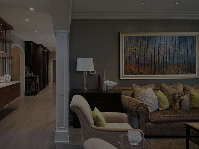 Neutral eclectic coastal living room with table lamp and unique painting in Highland Park