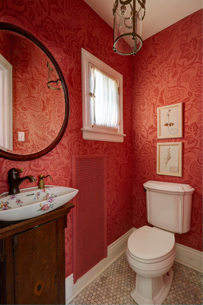Small and functional bathroom design, red color walls