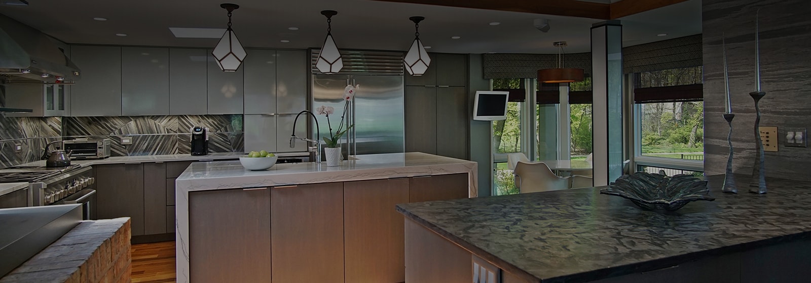 Fabulous two tone kitchen cabinets combined with big eating area in Lake Forest